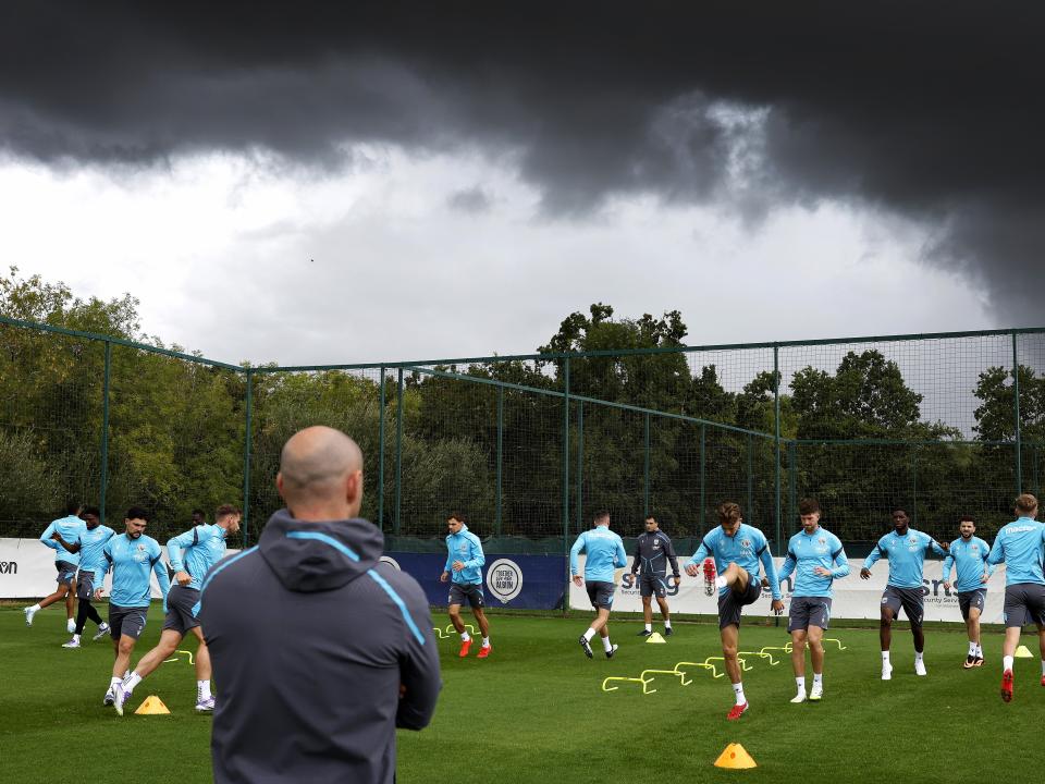 Albion players warming up before a training session