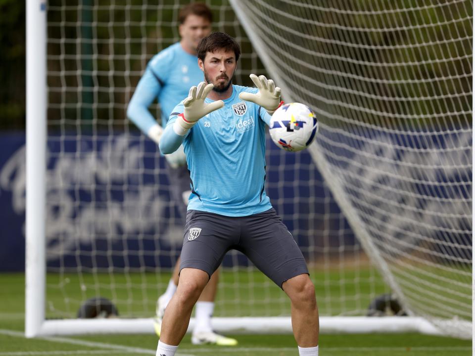 Joe Wildsmith catching the ball in training 