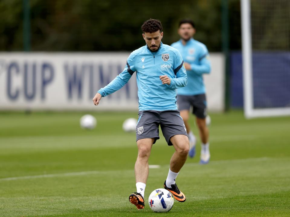 Mikey Johnston on the ball during training
