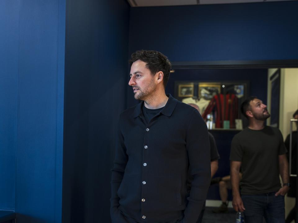 Ryan Mason walking through the East Stand looking at all the memorabilia and a specially curated gallery of 125 iconic Hawthorns images