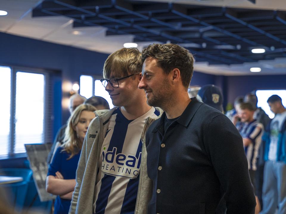 Ryan Mason posing for WBA fans in the East Stand