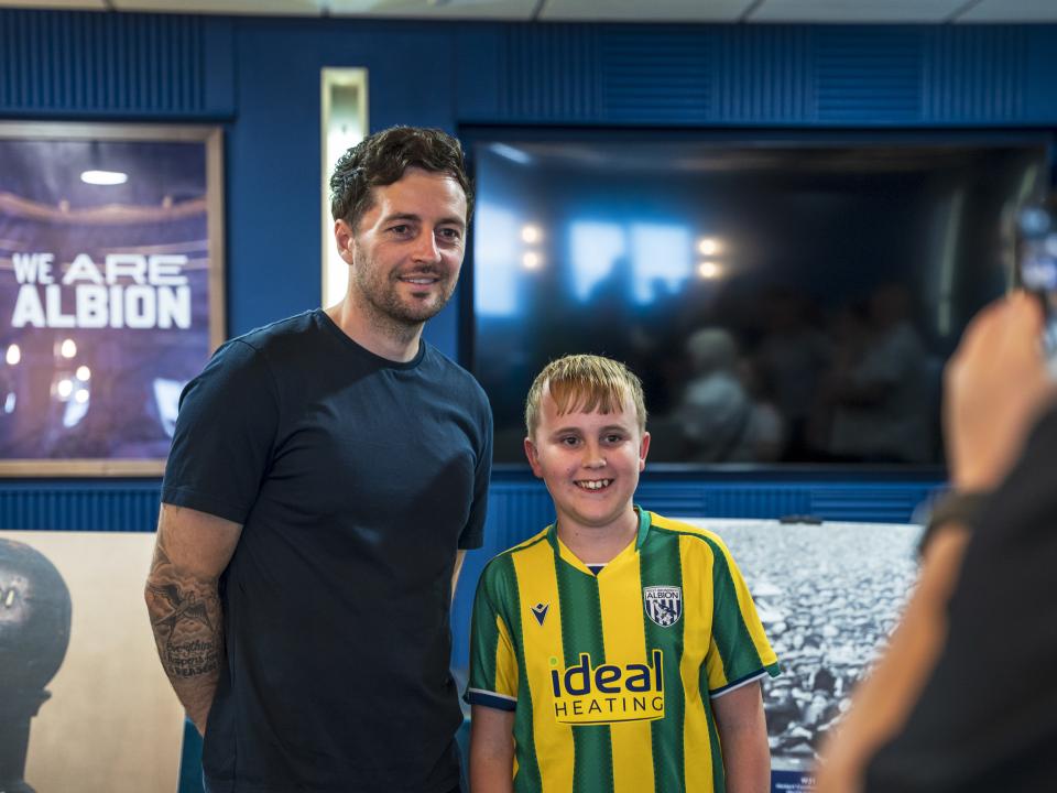 Ryan Mason posing for WBA fans in the East Stand