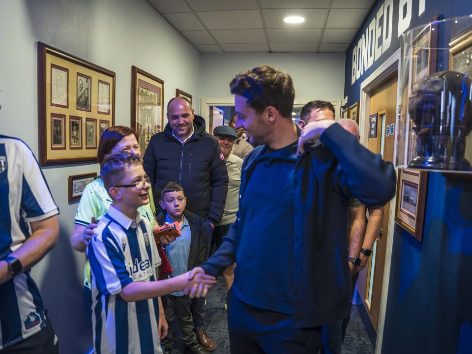Ryan Mason posing for WBA fans in the East Stand