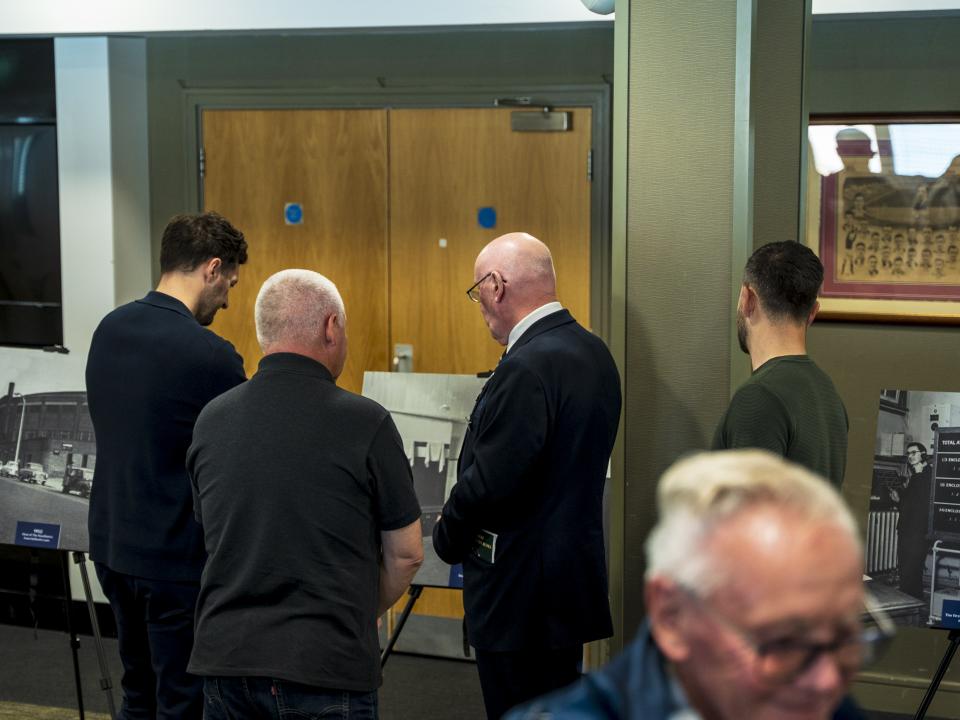 Ryan Mason walking through the East Stand looking at all the memorabilia and a specially curated gallery of 125 iconic Hawthorns images