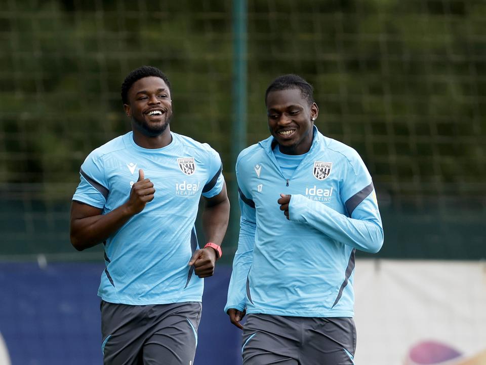 Josh Maja and Ousmane Diakité smiling during training 