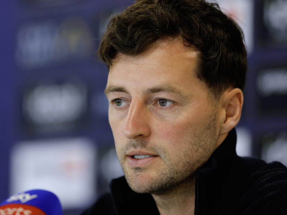 Ryan Mason speaking to the media during a press conference 