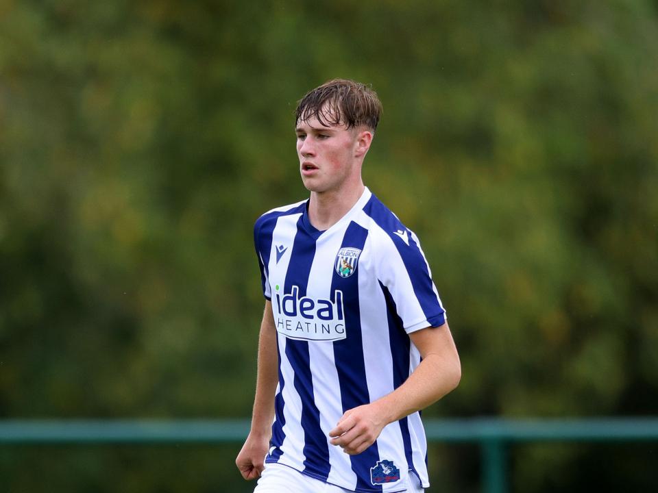 George Shaw in action for WBA's U18 side in the home kit 