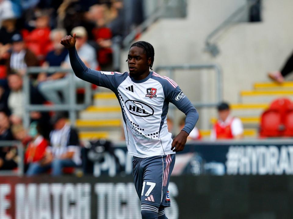 A photo of Akeel Higgins in loan club Exeter City's white away kit