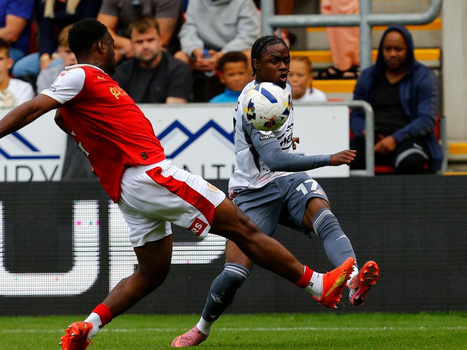 A photo of Albion youngster Akeel Higgins playing for loan club Exeter City in their white away kit