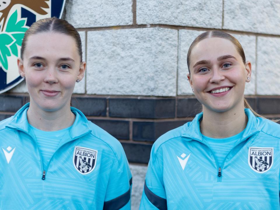 Millie Pullen (left) and Mia Sorrentin (right) smile at the camera while stood side-by-side 