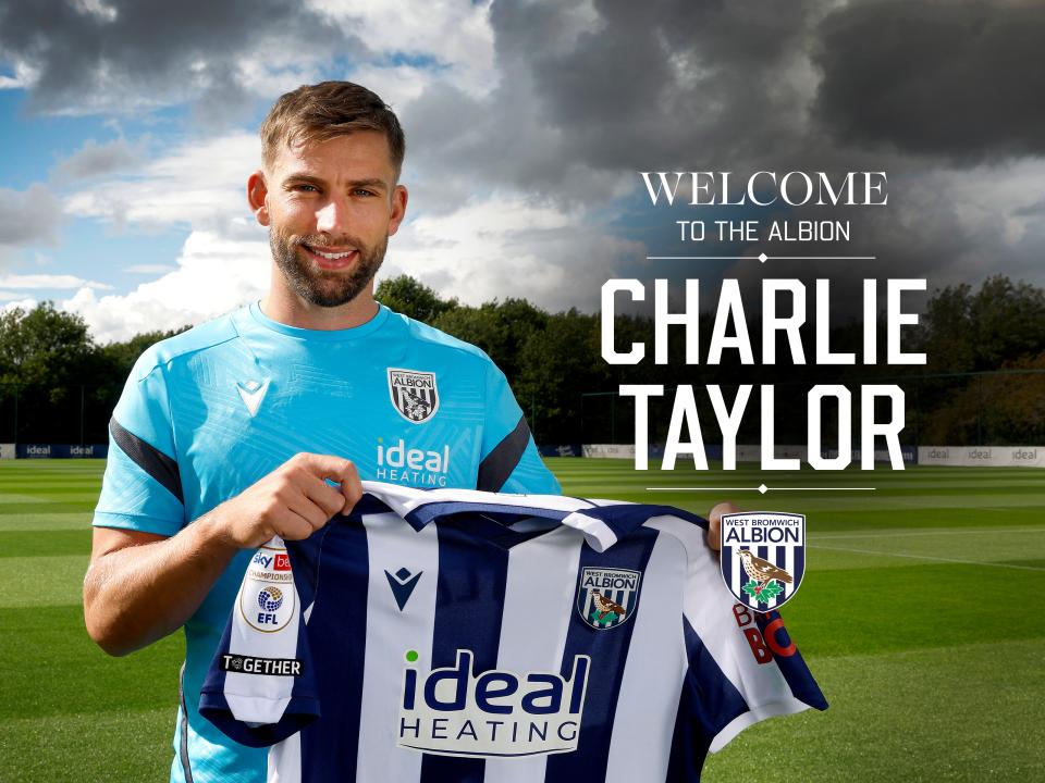 Charlie Taylor's arrival graphic with an image of him holding up a home shirt smiling at the camera 