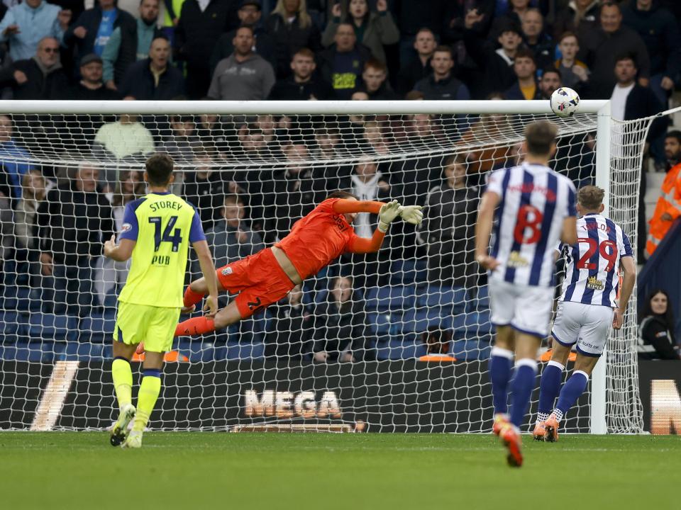 Josh Griffiths making a save against PNE