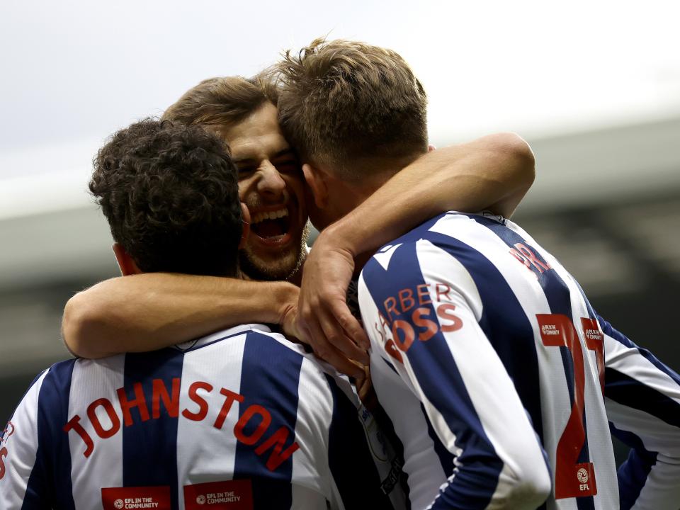 Jayson Molumby celebrates with Isaac Price and Mikey Johnston after their goals against Preston 