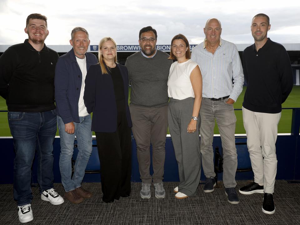 A group photo of the Albion Fan Advisory Board