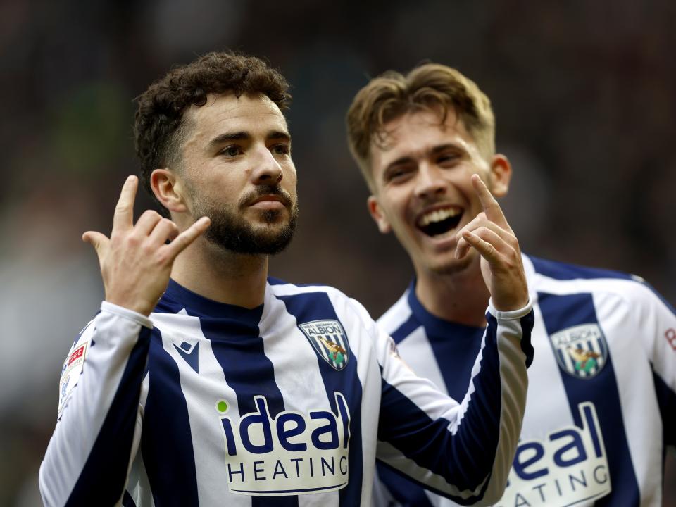 An image of Mikey Johnston and Isaac Price celebrating a goal against Preston