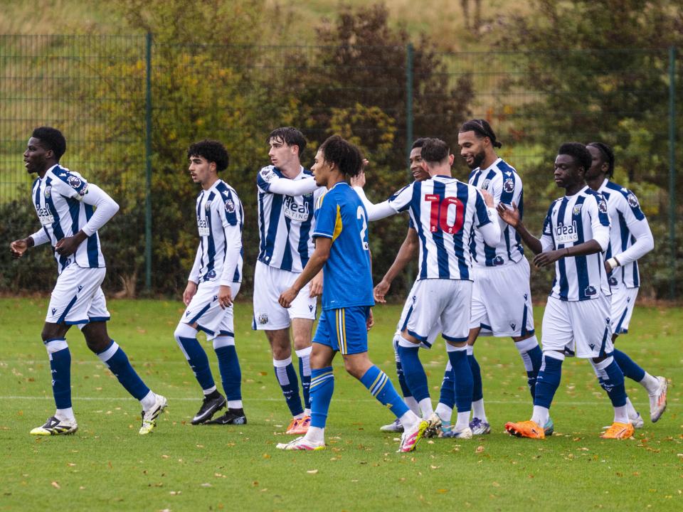 Albion's PL2 team celebrate a goal scored in the home kit against Leeds