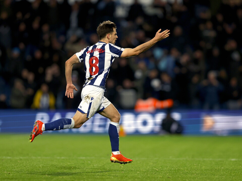 Jayson Molumby celebrates scoring against Swansea