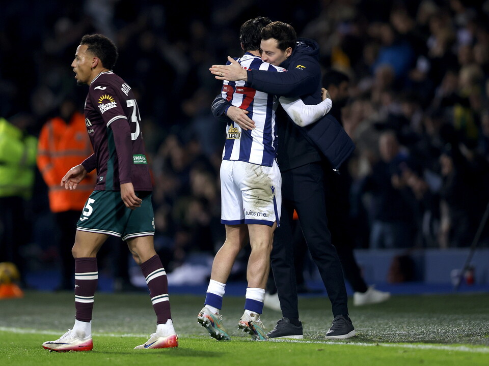 Alex Mowatt and Ryan Mason celebrating Albion's win over Swansea
