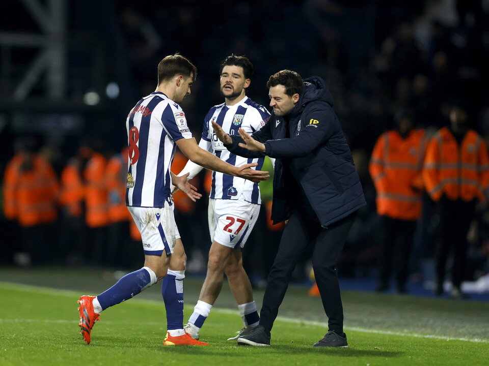 Jayson Molumby and Ryan Mason celebrating Albion's win over Swansea