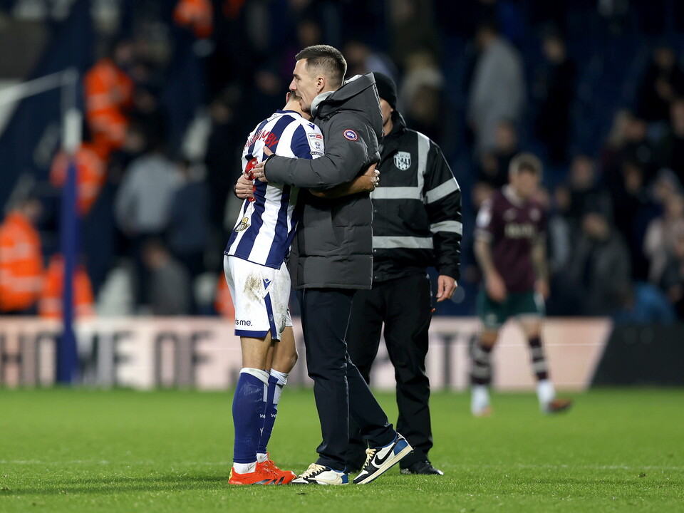 Jed Wallace hugs Jayson Molumby after the Swansea game