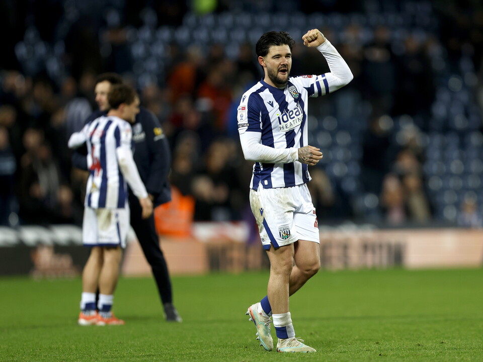 Alex Mowatt celebrating towards WBA fans after beating Swansea 