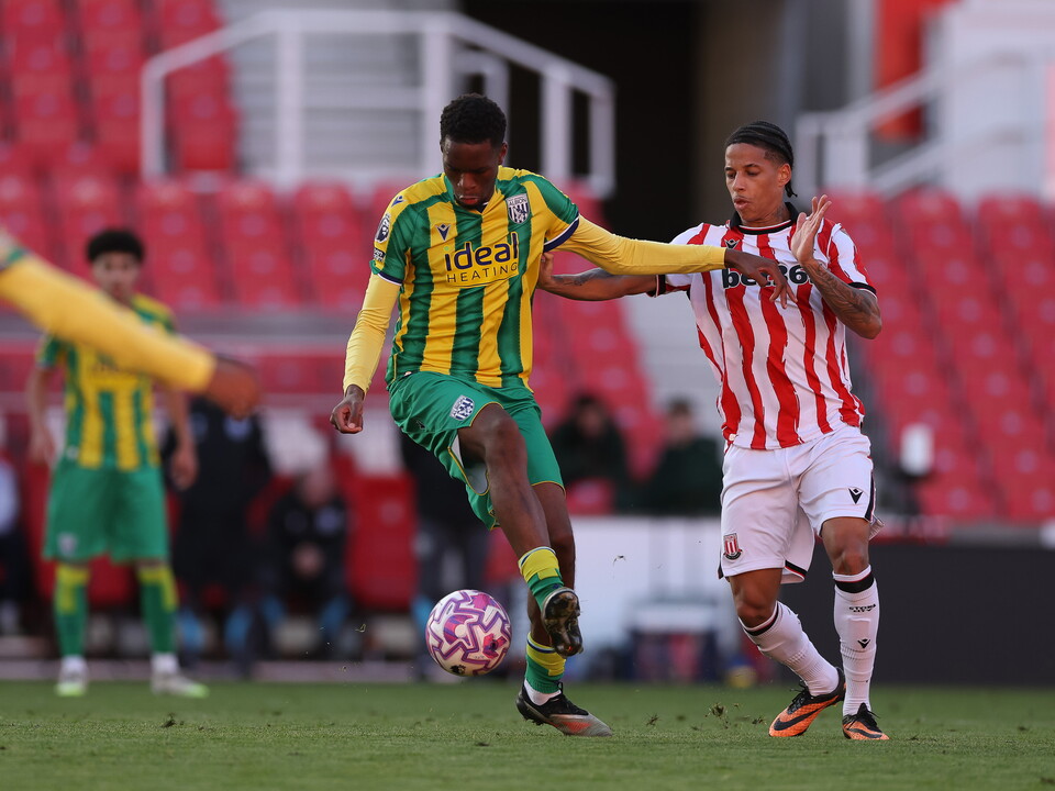A photo of Albion U21 midfielder Kevin Mfuamba in the 2025/26 green and yellow away kit