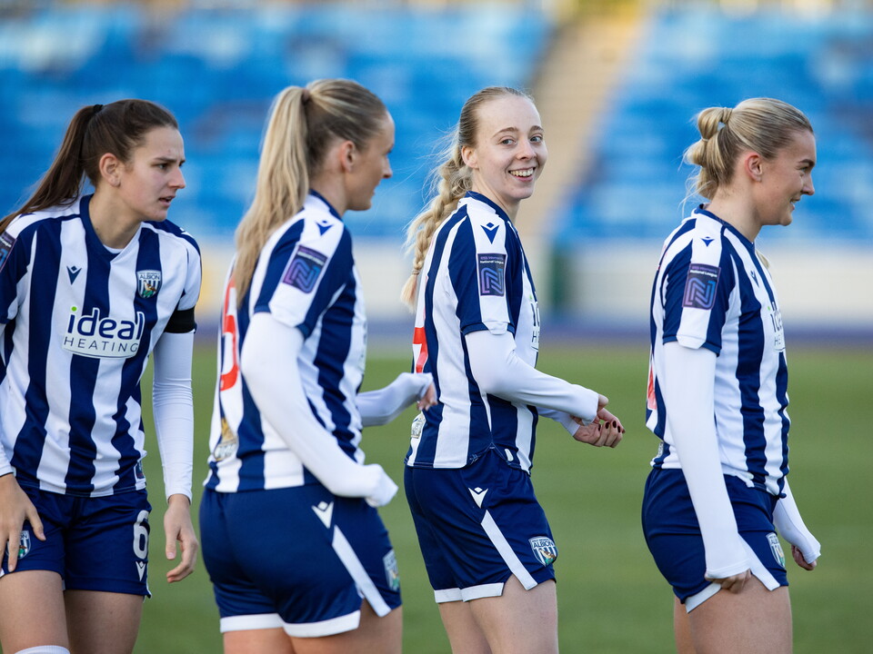 A photo of Ellie May celebrating a goal. 