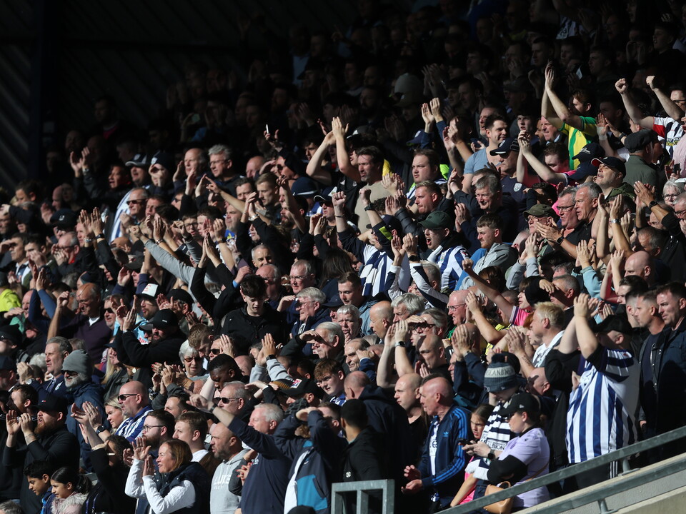 A general view of WBA fans cheering at a game 