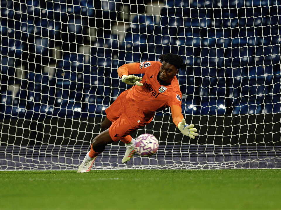 Brian Okonkwo makes a save.