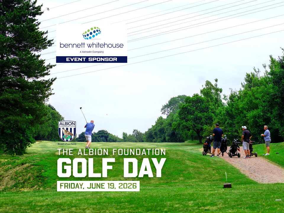 Wide photos of a Golfer teeing off with his teammates standing off to his right.
