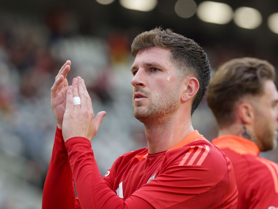 Chris Mepham applauding Wales fans 