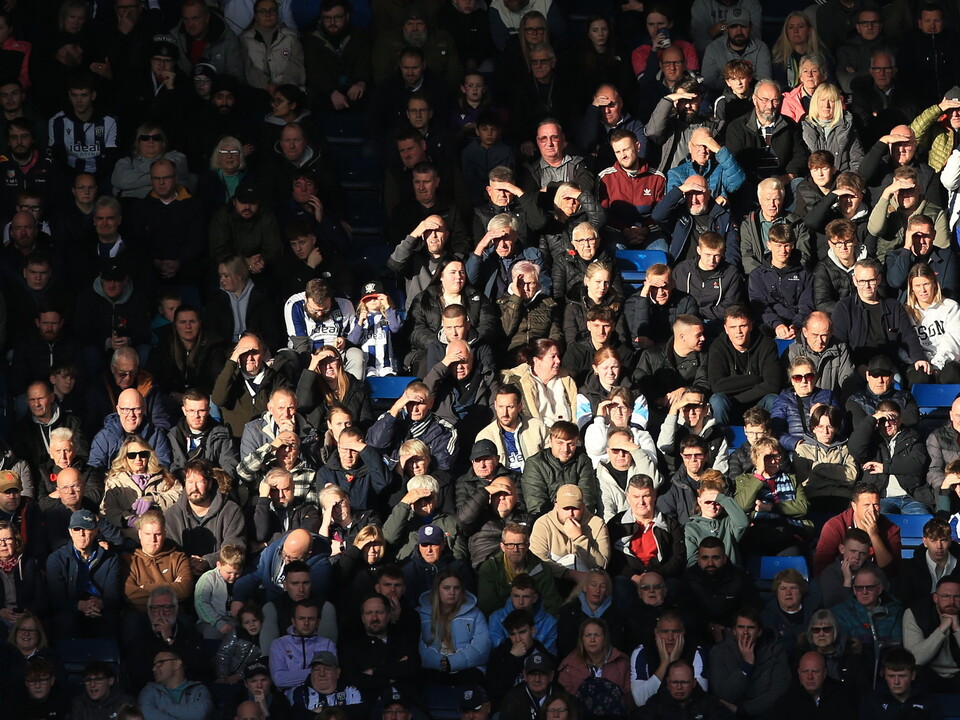 A general view of several WBA fans watching a game 