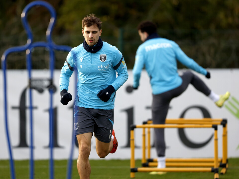 Jayson Molumby warming up before a training session