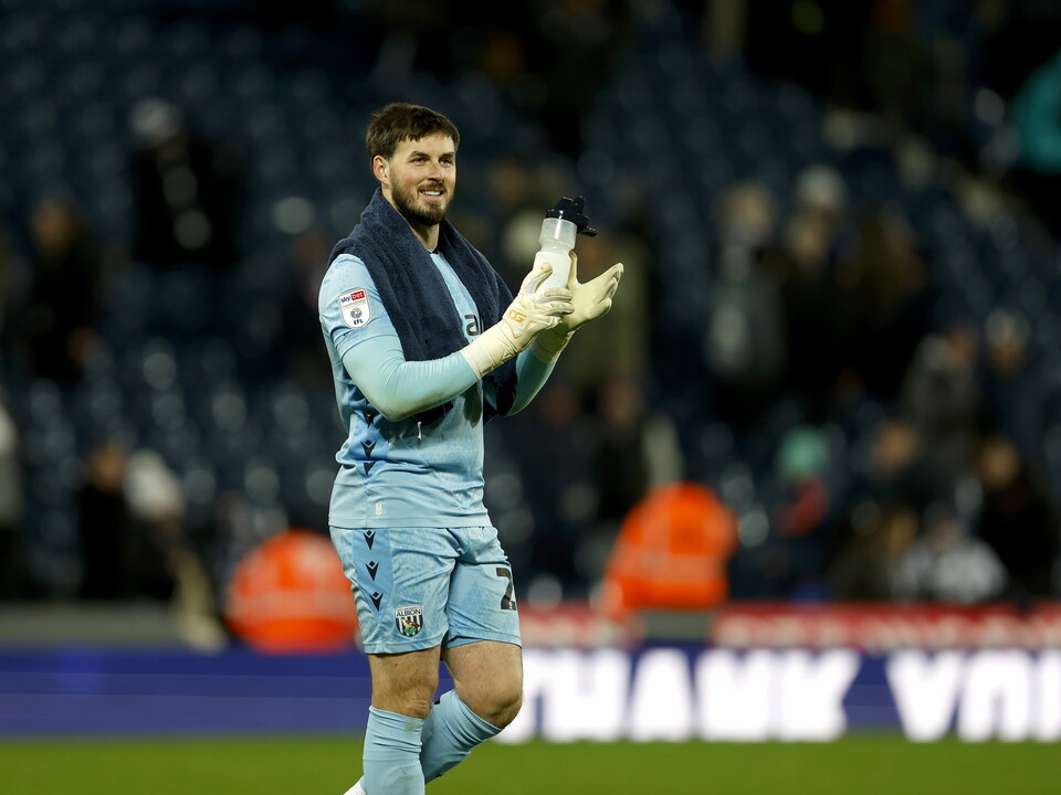Joe Wildsmith applauding WBA fans after beating Sheffield United