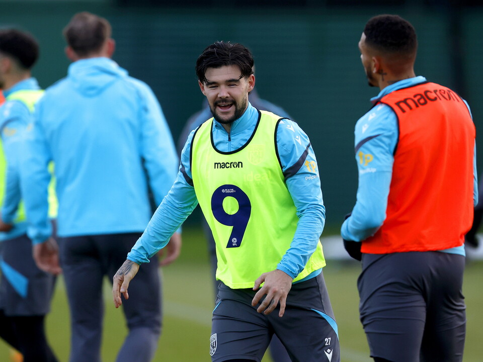 Alex Mowatt smiling during a training session