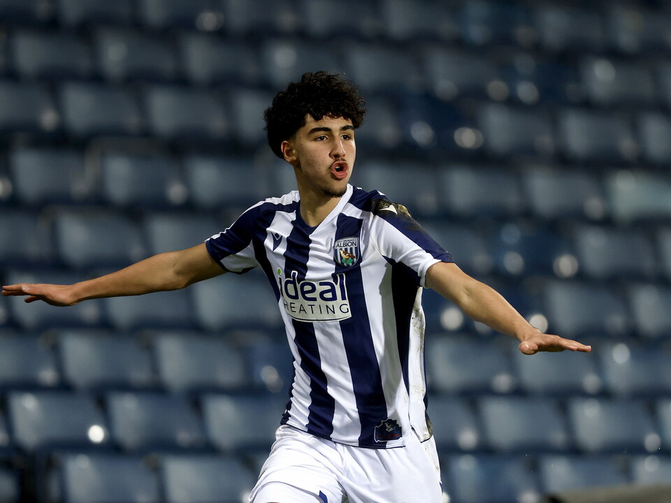 A photo of U18 defender Adam Letlat in the 2025/26 home kit