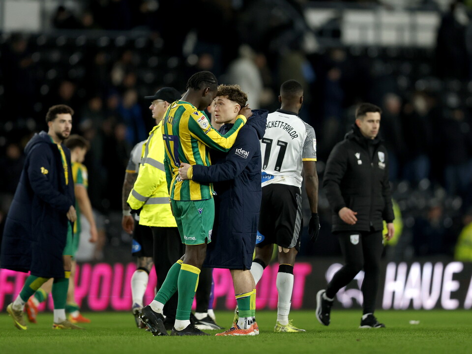 Callum Styles hugging Ousmane Diakité