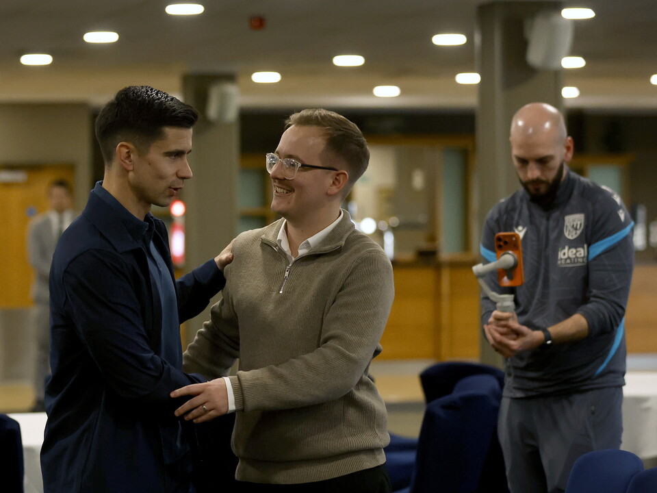 Eric Ramsay speaking to a local journalist