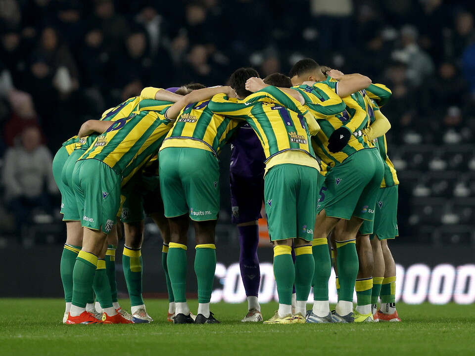 WBA in a team huddle before kick off at Derby 