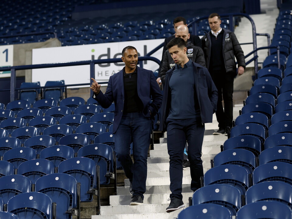 Shilen Patel and Eric Ramsay talking while walking around The Hawthorns