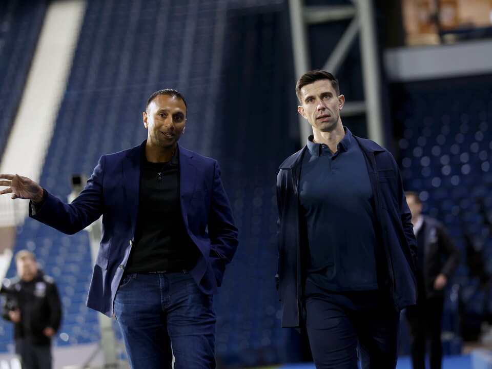 Shilen Patel and Eric Ramsay talking while walking around The Hawthorns