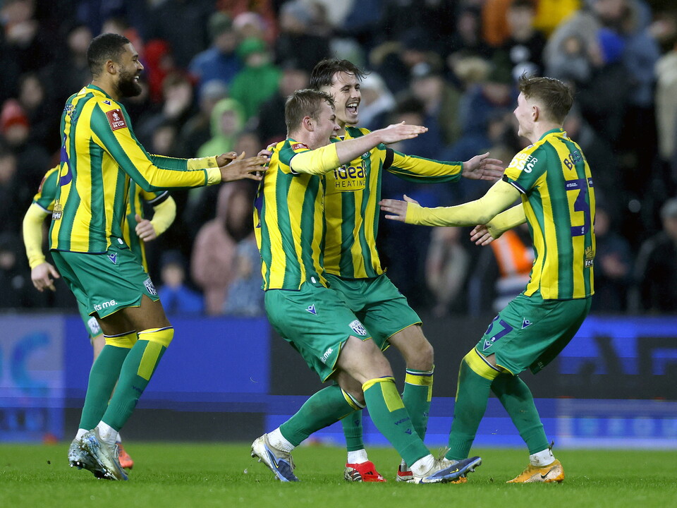 Albion celebrate their penalty shootout win.
