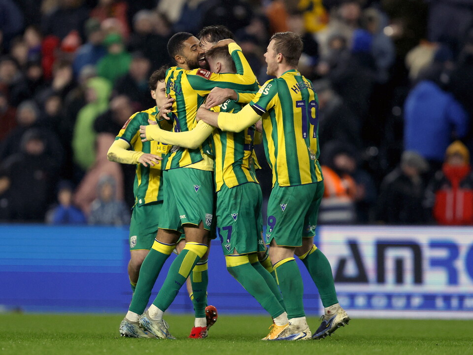 Albion celebrate their penalty shootout win.