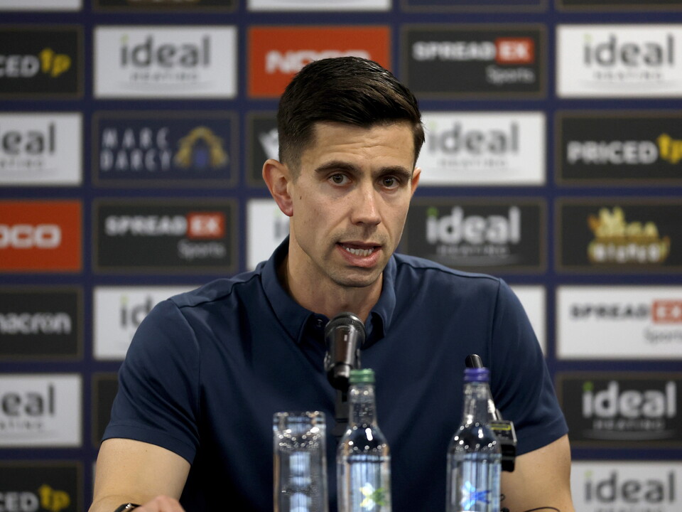 Eric Ramsay speaking to the media in a press conference 