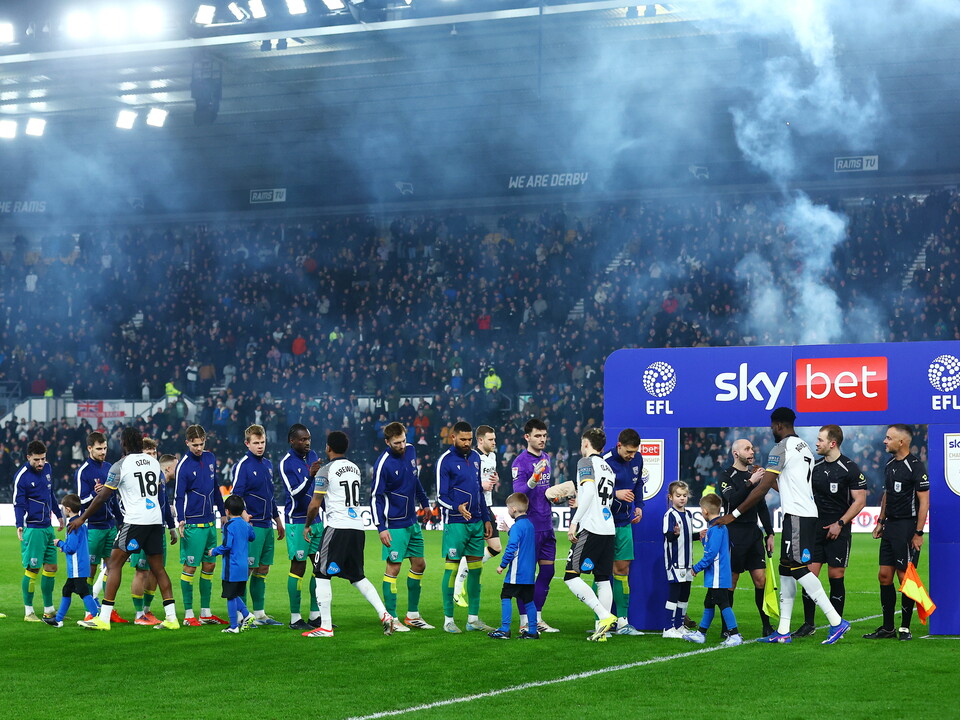 Derby and WBA shaking hands before kick off at Pride Park