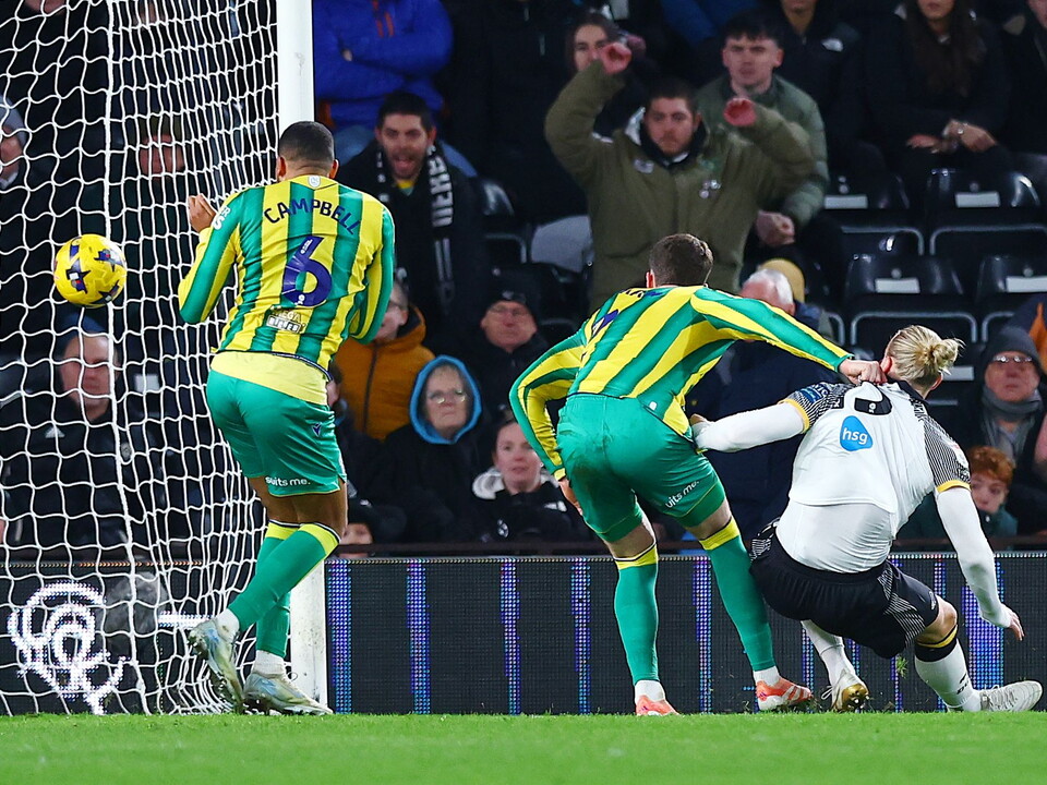 Chris Mepham scoring a header at Derby