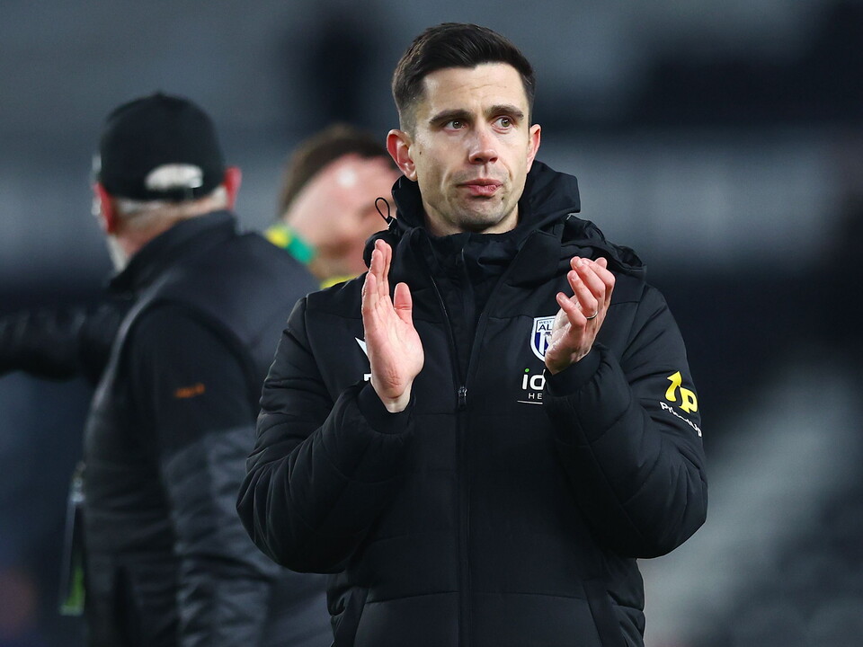 Eric Ramsay applauding WBA fans at Derby
