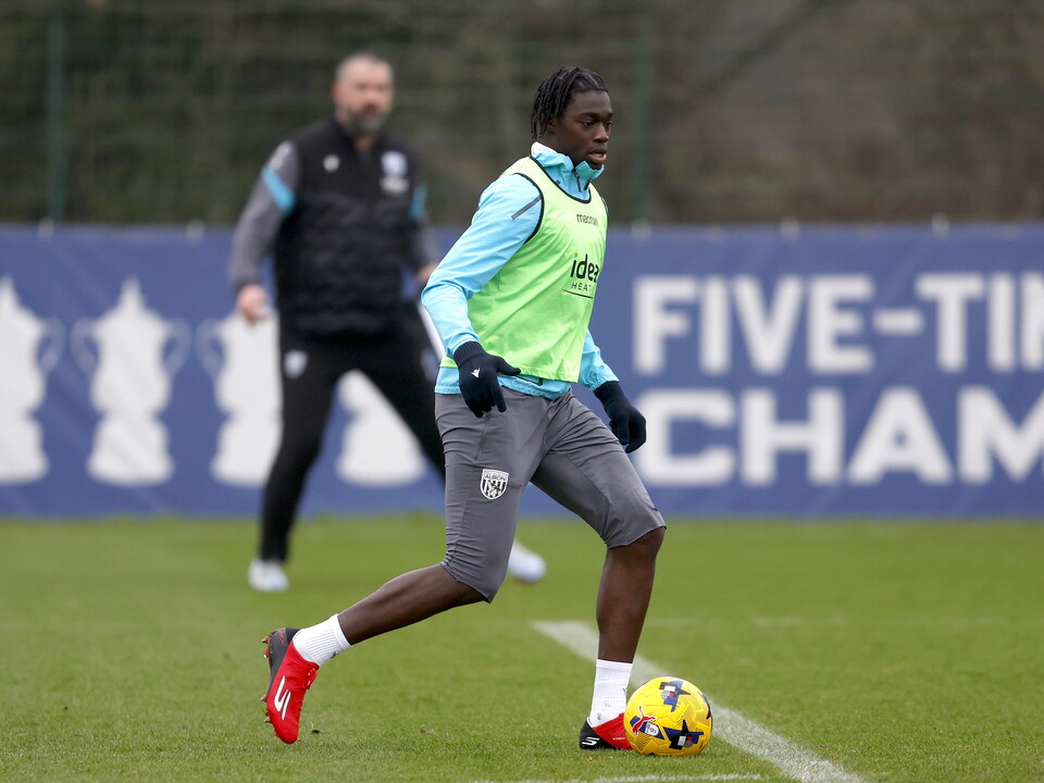  Hindolo Mustapha in training in a green bib