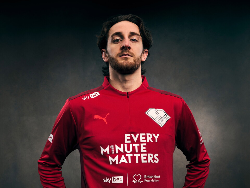 Tom Lockyer in a British Heart Foundation top