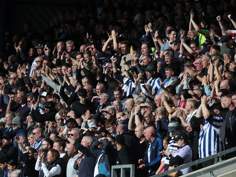 WBA fans cheering in the stand at Oxford 